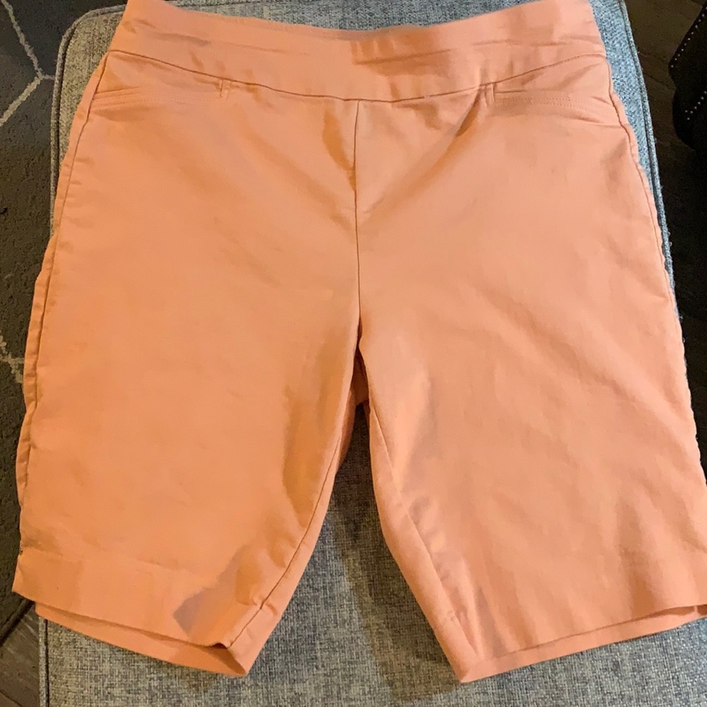 Women’s orange Croft & Barrows Bermuda shorts.